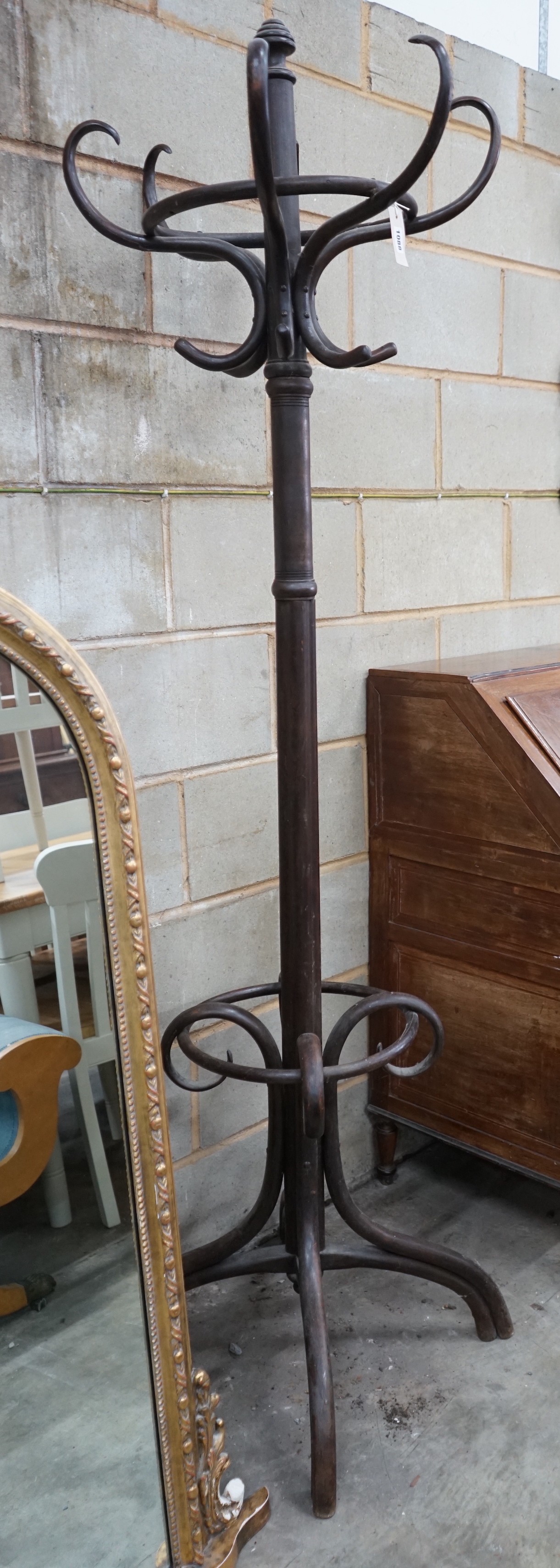 An early 20th century Thonet style beech Bentwood coat and stick stand, height 199cms.